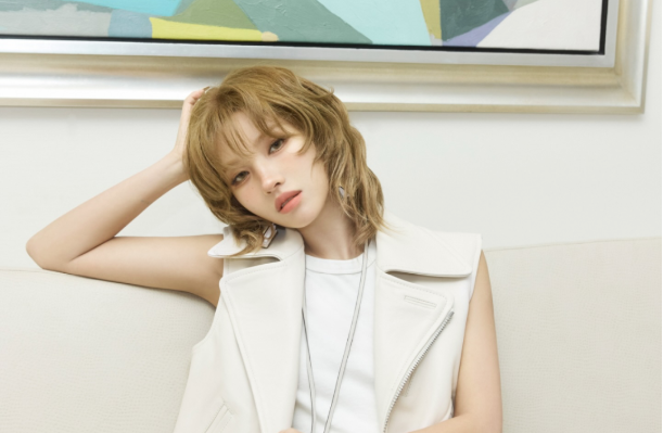 Short statement wolf cut with dramatic crown layers and strong flick at the ends, the boldest version of the style