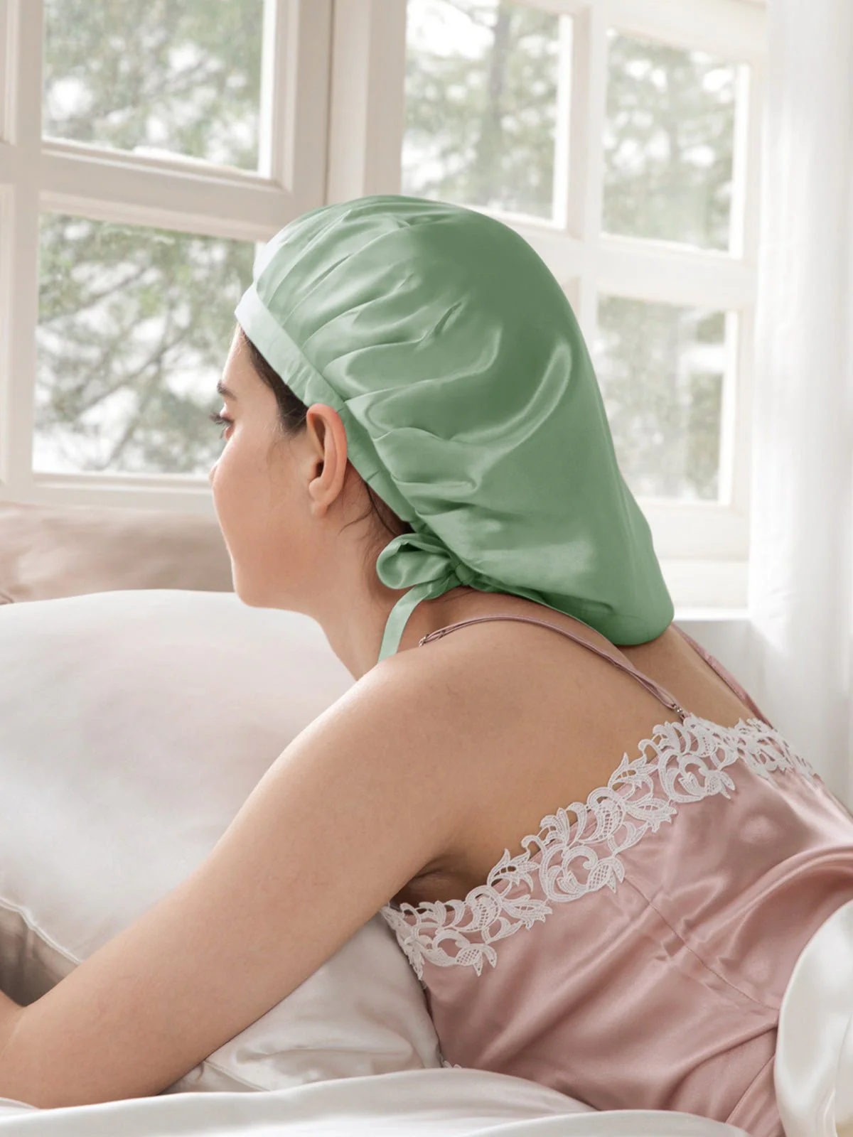 A smooth satin bonnet keeps hair contained overnight