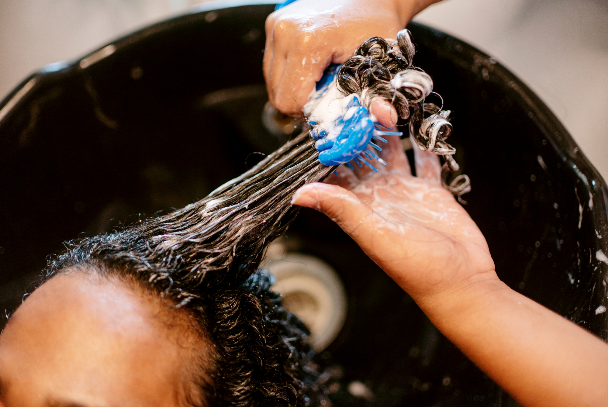 How Often Should You Wash Textured Hair? The Answer Depends on More Than Your Curl Pattern