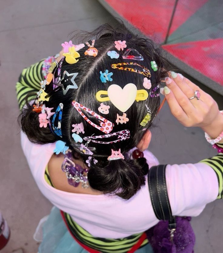 Maximalist and colorful hair clips to add details to space buns. 
