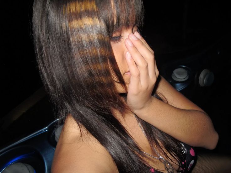 An alternating between blonde and brown hair creates a raccoon tail pattern.