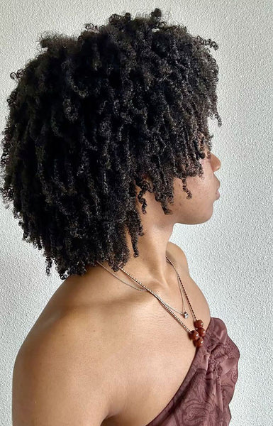 Natural coily texture worn out and shaped