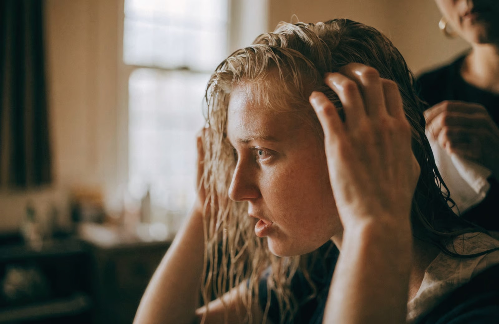 A professional mineral-removing treatment at the bowl lifts the buildup a chelating shampoo starts on, and it is worth every cent before a color service.