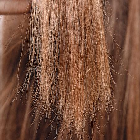 Hair that is already dry, brittle, or split at the ends is far more likely to react badly to chemical straightening.