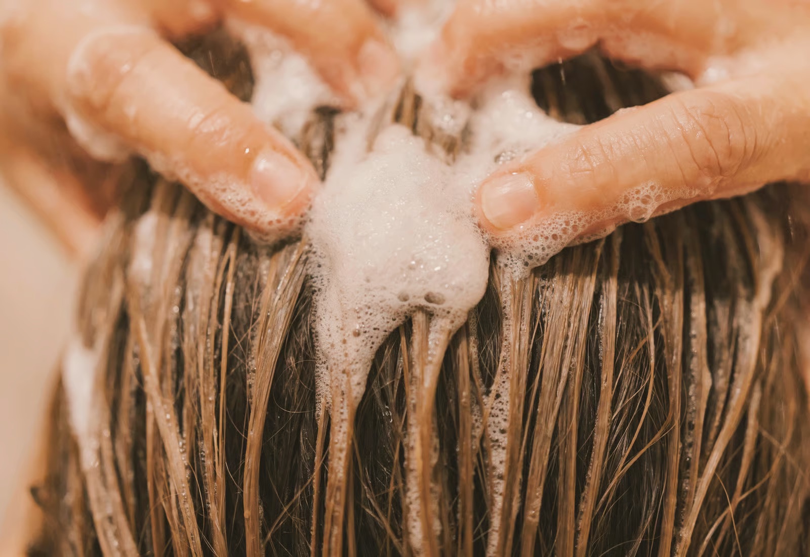 Shampoo is for your scalp, not your lengths. Work it into the roots where the oil actually lives and let the runoff clean the rest.